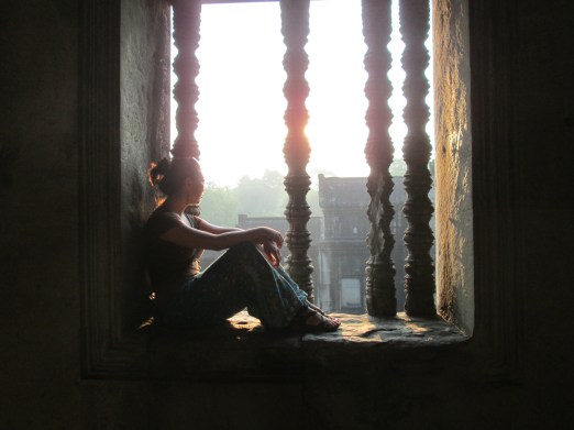 Catching the sunrise from inside Angkor Wat
